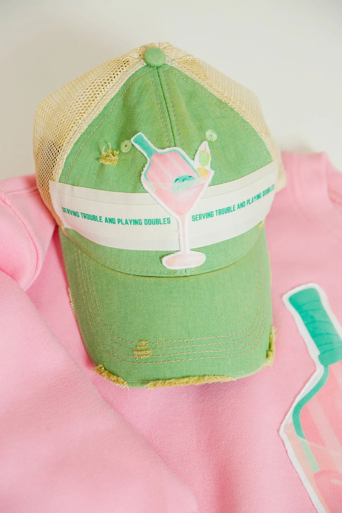 SERVING TROUBLE GREEN DISTRESSED HAT